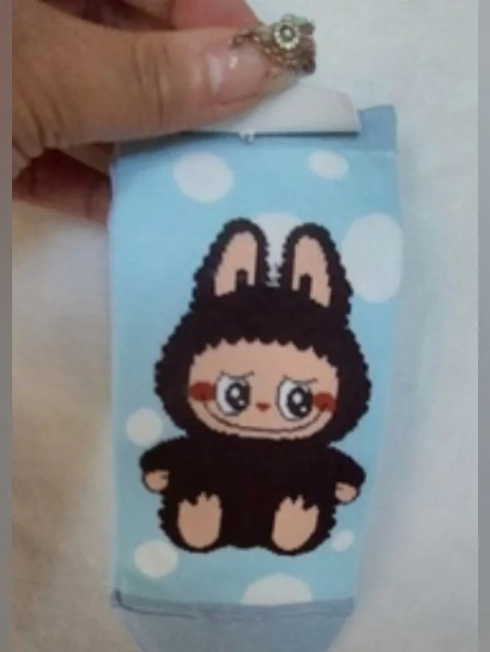 5 pairs of the ugly but cute Labubu Character footies Socks.